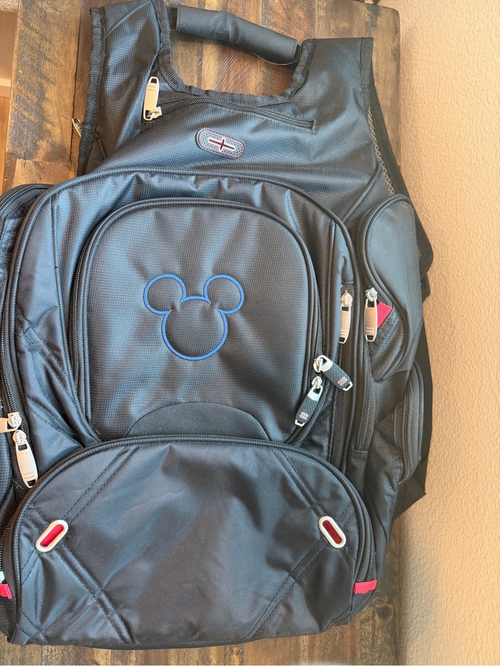 Disney Black Backpack with Blue Mickey Outline and Red Accents